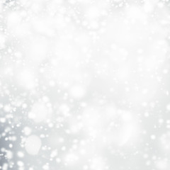 Silver  abstract bokeh background with snowflake and white glittering bokeh stars. A shiny holiday...