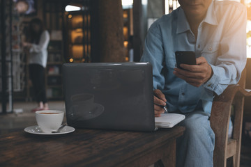 Businessman working at cafe