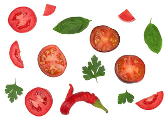 Tomato sliced, bitter pepper, parsley leaves isolated on white, top view