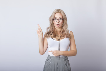 Portrait of smiling beautiful blonde woman looking camera