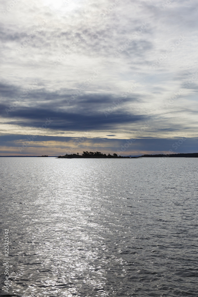 Canvas Prints Sunset view of the water with isles in silhouette