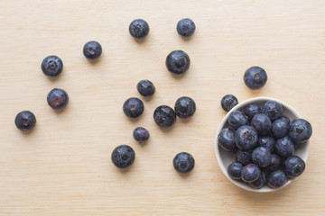 Naklejka na ściany i meble blueberry on wooden background. for healthy food concept.