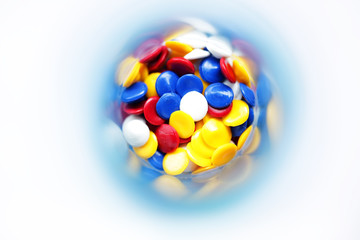 colorful industrial plastic pellet in test tube background