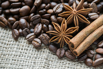 Anis and cinammon near cofee beans