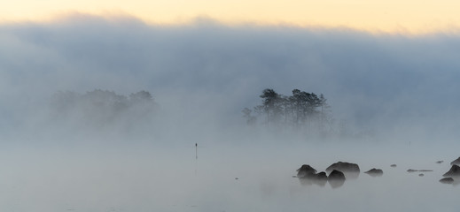 Misty morning over lake