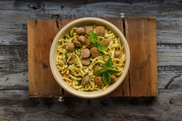 Homemade spaetzle, barbecue sausage and fresh cheese