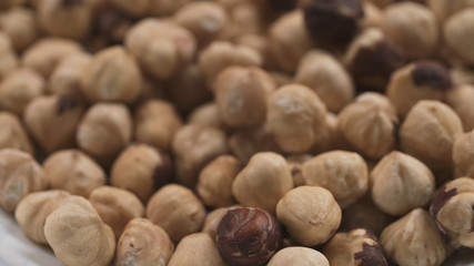 closeup roasted hazelnuts background
