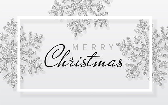 Christmas background with shining silver snowflakes and white frame. Merry Christmas and Happy New Year card. Vector Illustration