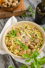 Homemade spaetzle, barbecue sausage and fresh cheese