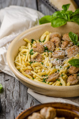 Homemade spaetzle, barbecue sausage and fresh cheese
