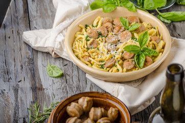 Homemade spaetzle, barbecue sausage and fresh cheese