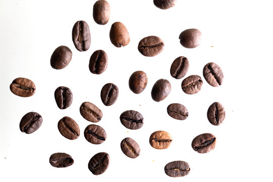 Isolated coffee beans on white background © ContributorArtist