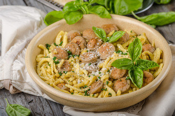 Homemade spaetzle, barbecue sausage and fresh cheese