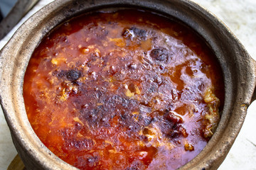 Close-up shoot of traditional turkish food in old casserole