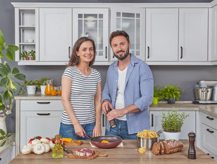 Couple enjoying in the kitchen