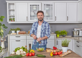 Handsome man preparing dinner