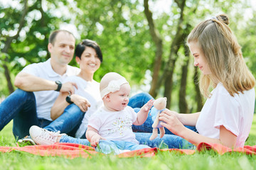 Fototapeta premium family with children in summer park. happy parenting