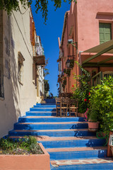 Fototapeta na wymiar Blue steps of a small street in Rethymno, Crete