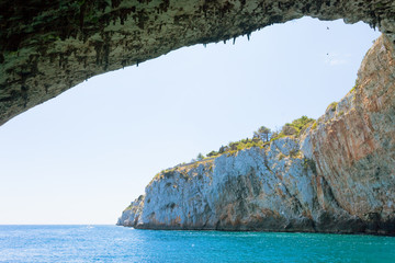 Apulia, Grotta Zinzulusa - Flying birds at the gigantic cave arch of Grotto Zinzulusa