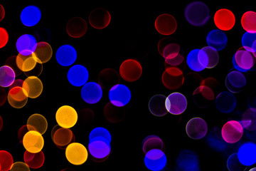 Bokeh-abstraction: Colored circles dancing in the night