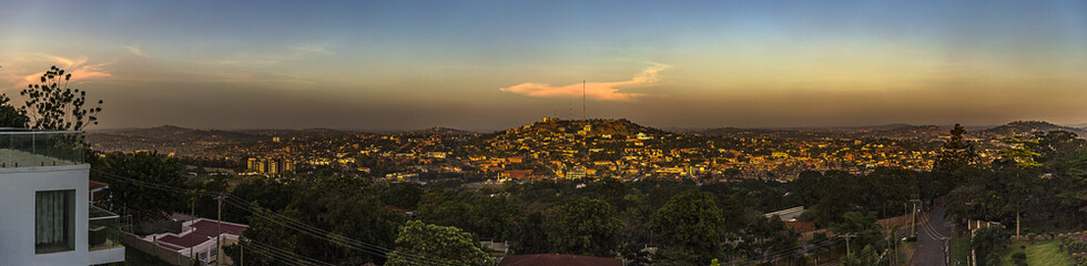 Fototapeta na wymiar Elongated Views of Kampala as seen from Kololo hill at dusk 2