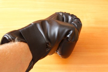 Boxing glove on hand