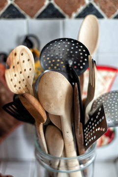 Still life of kitchen utensils in a jar