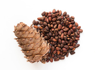 Pine nuts with cones isolated on white background. Top view. 