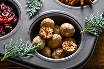 Fototapeta na wymiar Nutmeg, spice for christmas, baking and cooking ingredient