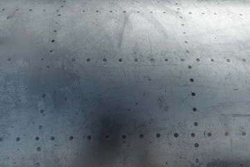 Texture, Aluminum fuselage and rivets on an old plane. Old technologies. copy space