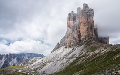 Summer panorama view of Three Peaks - Tre Cime di Lavaredo Massive Rock, Sexten Dolomites, South Tyrol. Dolomite Alps, Italy