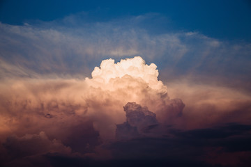 Colorful clouds on dramatic sunset sky