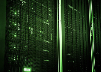 Futuristic techno design on background of fantastic supercomputer data center. Network server room with computers for digital communications and internet,abstract data concept.