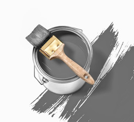 Grey paint tin can with brush on top white background with grey strokes © Tjeerd