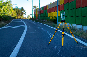 Surveyor equipment (theodolit or total positioning station) on the construction site of the...
