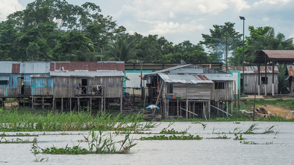remote village in the amazon rainforest of peru