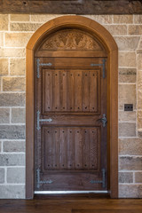 Medieval style door and stone wall