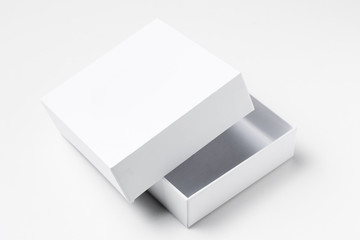 Close up white open cardboard gift box on white background isolated