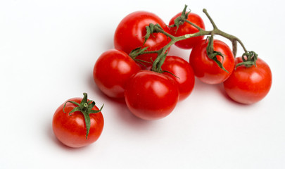 Cherry tomatoes on white background