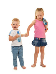 Native brother and sister in full growth with water bottles isolated on white