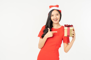 Photo of asian curious woman in red dress rejoicing her birthday or new year gift box. Young woman holding gift  box with red bow being excited and surprised  holiday present isolated white background