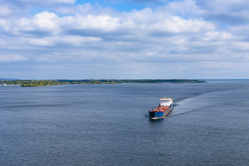 Cargo ship sailing on the sea or river