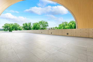 Empty square floor and modern urban architecture