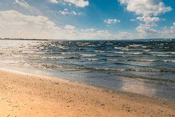 Obraz premium Beautiful seascape - small waves and a deserted beach