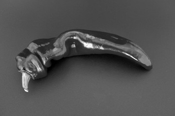 pepper on a black background