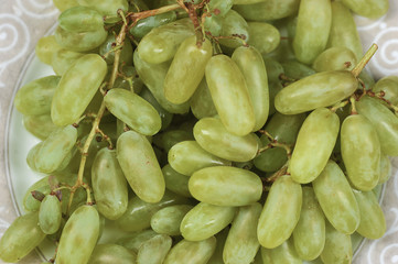 Tasty fresh green grape in a plate