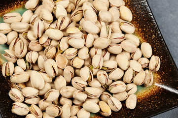 pistachios in a bowl - top view
