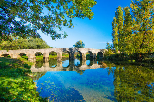     Old stone bridge on the river Dobra in Karlovac county, Croatia 