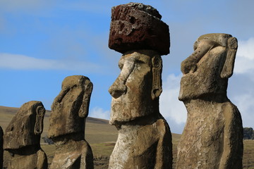 Four of fifteen huge Moai statues of Ahu Tongariki ceremonial platform on Easter Island, Chile,...