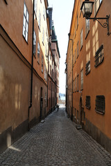 Fototapeta na wymiar old street in the old city in Stockholm
